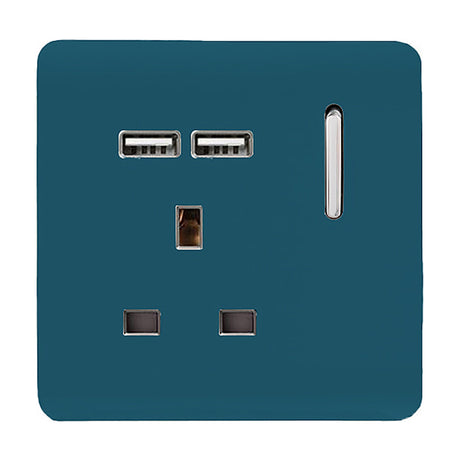 Ocean blue 1 gang 13A socket with screwless flat plate, chrome rocker switch, two USB-A charging ports, and a single UK pin outlet on a white background.