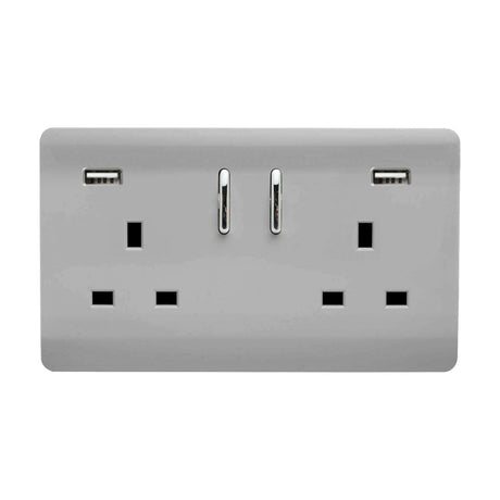 Double 13A switched socket in screwless brushed steel with chrome inserts, featuring two USB-A charging ports and rocker switches, shown on a plain white background.