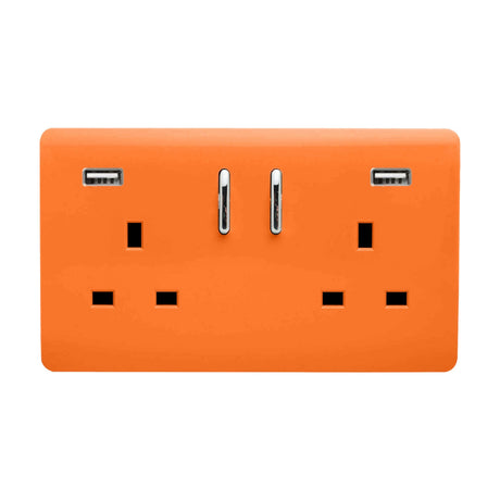 Orange 2 gang double 13A switched socket with screwless plate, chrome rockers, and two USB-A charging ports (15W shared), on a plain white background.