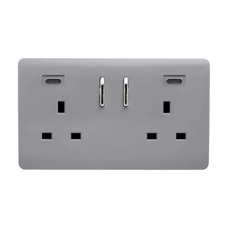 Screwless 2 gang double 13A switched socket with two USB-C ports and chrome switches on a platinum silver plate, shown on a plain white background.