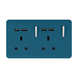 Ocean Blue 2 gang double 13A switched socket with four USB-A charging ports and chrome rocker switches, screwless plate on plain white background.