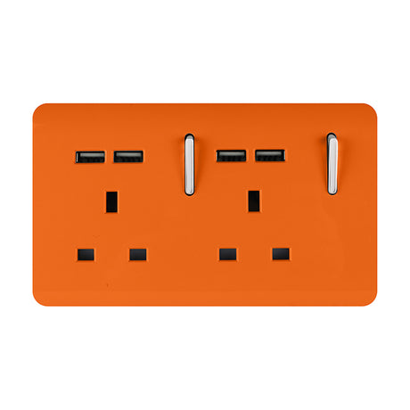 Orange double 13A socket with screwless plate, two rocker switches, and four chrome USB-A ports arranged in pairs, shown on a plain white background.
