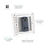 Rear view of a 1 Gang 3 Way Light Switch in Carbon Fibre showing the white mounting plate, screwless clip-on front, captive screws, and terminal block for a 35mm box.