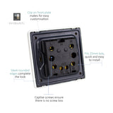Rear view of a 1 Gang 20A Double Pole Neon Light Switch showing the black mounting plate with L, N, and OUT terminals, captive screws, and clip-on front plate fitting for a 25mm box.