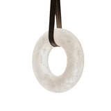 The Cintura LED Small Alabaster Single Pendant Light in soft white and brown is suspended by two black straps against a plain white background.
