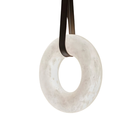 The Cintura LED Small Alabaster Single Pendant Light in soft white and brown is suspended by two black straps against a plain white background.