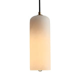 The Velmora 1 Light Slim Cylindrical Alabaster Single Pendant Light in soft white and brass hangs from a black cord with a sleek brass ceiling plate, its tall alabaster shade set against a plain white background.