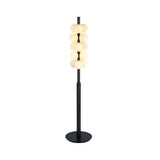 The Varelle Stacked Alabaster Floor Lamp in Soft White & Matte Black features paired spherical alabaster lights on a sleek black base and stand, providing striking sculptural lighting for modern interiors.