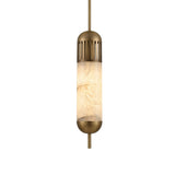The Zerith LED Fluted Tube Alabaster Single Pendant Light in Soft White & Brushed Brass features a frosted glass center for a warm glow, metallic accents at top and bottom, and vertical slits near the top.