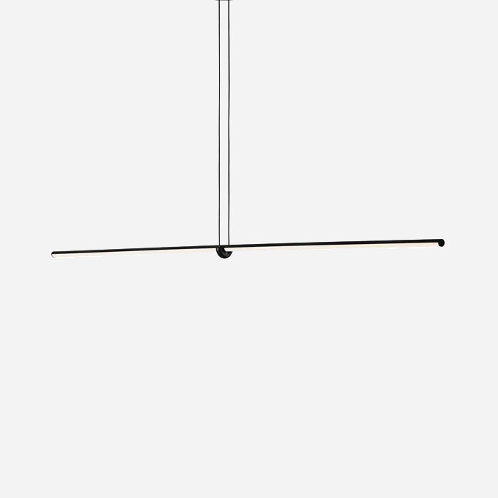 The Minimo LED Large Bar Suspension Light in black is a minimalist pendant light fixture, showcasing an energy-efficient design with a long, slender horizontal bar hung from two thin cords against a white backdrop.