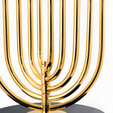 Close-up of the Ascot 4 Light Large Table Lamp in black and gold, its elegant curved design standing out on a black base against a white background—perfect as dramatic statement lighting with an Art Deco flair.