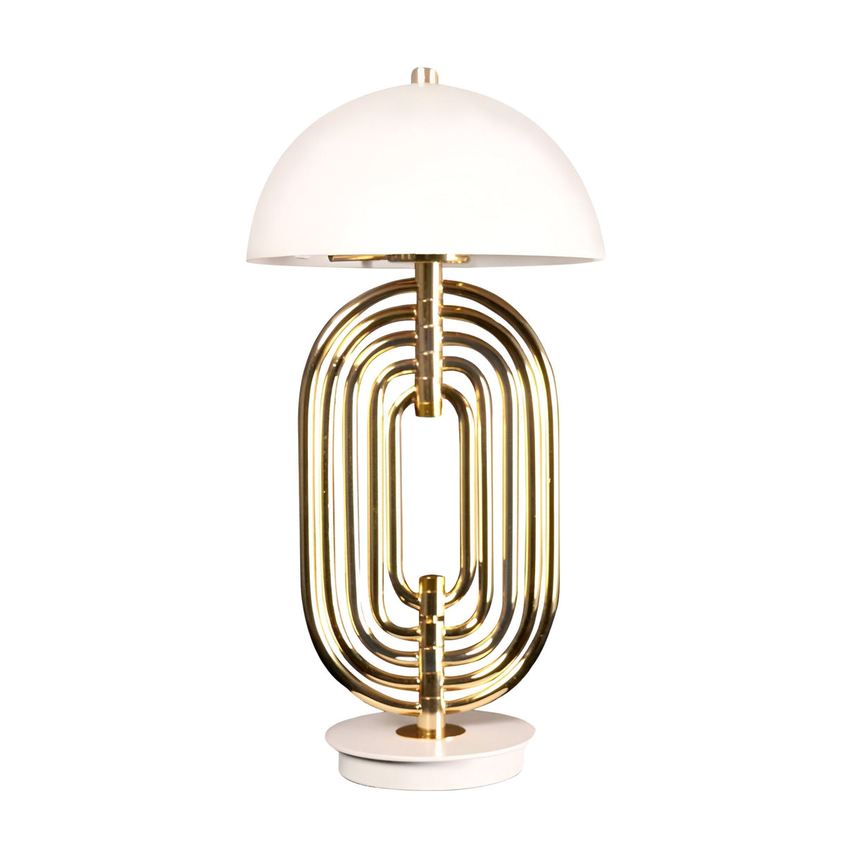 The Ascot 4 Light Large Table Lamp features a white dome-shaped shade and a base with gold-finished concentric oval rings on a round white platform, combining modern Art Deco style in elegant white and gold.