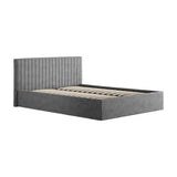 Berlin Ottoman double bed frame in silver velvet, featuring a vertically channel-stitched headboard and upholstered base with wooden slats, shown on a plain white background.