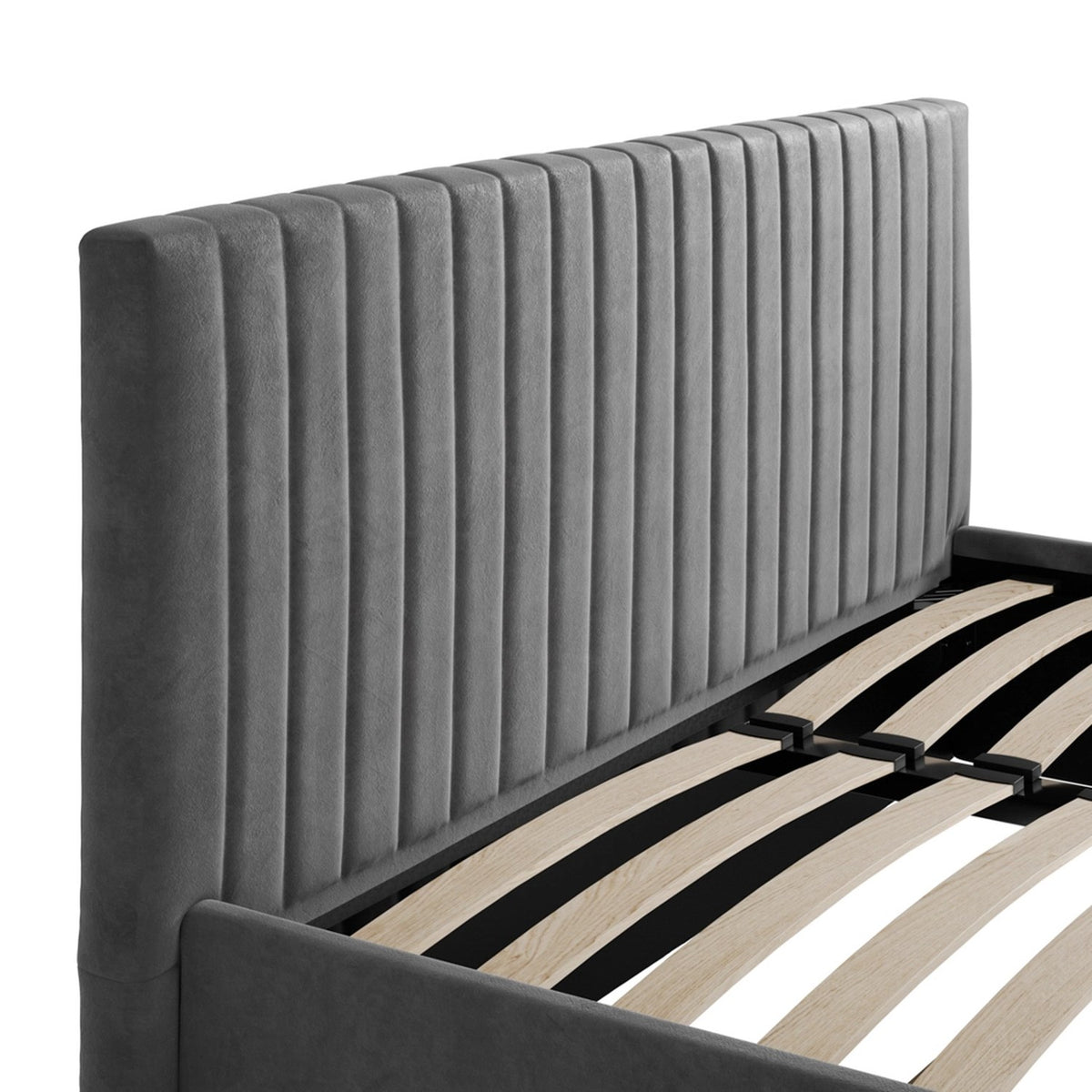 Close-up of the Berlin Ottoman double bed frame in silver velvet, showing the vertically channel-tufted headboard and wooden slatted base with black metal support brackets.