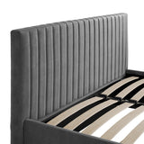 Close-up of the Berlin Ottoman double bed frame in silver velvet, showing the vertically channel-tufted headboard and wooden slatted base with black metal support brackets.