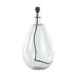 Baba Small Tall Recycled Glass Lamp Base in clear, teardrop-shaped with uneven glass walls, chrome collar, black E27 lampholder, and visible brown flex, shown on a plain white background.
