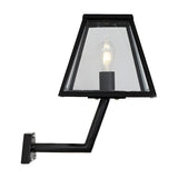 Small contemporary black outdoor wall lantern with clear glass panels and exposed filament bulb, mounted on an angled steel bracket against a plain white background.