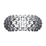 Rows of clear, spherical glass beads form a round, transparent bowl with a grid pattern and open texture, echoing the design of the Briller LED Large Wall Light - Transparent.