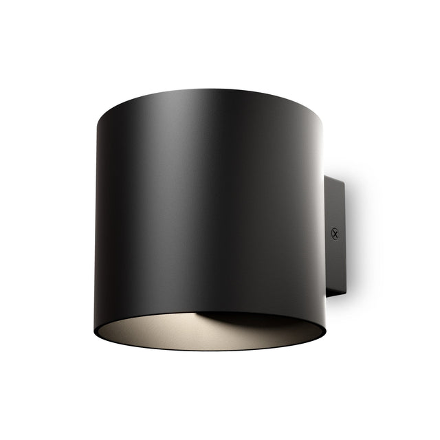 Rond black up and down wall light, providing dual light distribution for modern wall settings.