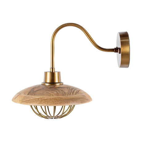 Chakai mango wood wall light with a shallow domed wooden shade over an open antique brass wire cage, mounted on a brass swan-neck arm and round wall plate, shown on a plain white background.