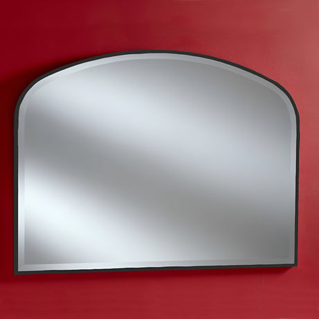 The Camden Overmantle Wall Mirror in black, measuring 107x79cm, is elegantly topped with an arch and mounted on a red wall.