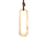 Serava LED Small Alabaster Pendant Light in soft white, elongated oval stone form on a brown leather strap suspension, shown against a plain white background.