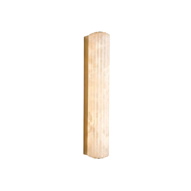 Zenvia LED Alabaster Wall Light in Brushed Brass, a tall fluted column-shaped fixture with warm-glowing natural alabaster shade, shown on a plain white background.