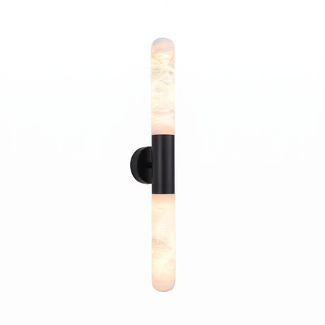Averin LED Alabaster Wall Light in Matte Black, featuring two vertical alabaster columns joined by a round black centre bracket, shown lit against a plain white background.