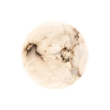 Orvani Small round wall light with a natural alabaster dome and copper body, shown as a 200mm circular stone disc on a plain white background.