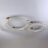 Orbis Extra Large LED Alabaster Semi-Flush Ceiling Light in soft white, shown as two oval rings with brushed brass ceiling mounts against a plain white background.