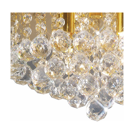 Close-up of the Dahlia 4 Light G9 Flush Ceiling Light in French gold, showing faceted clear crystal balls and gold fittings against a white background.
