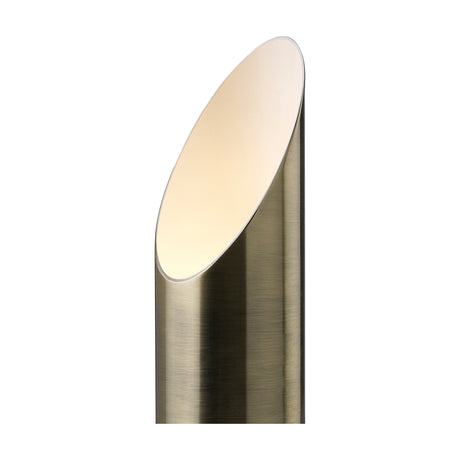 Indio GU10 Table Lamp in antique brass, a cylindrical iron tube with an angled top opening revealing a warm-lit interior, shown against a plain white background.