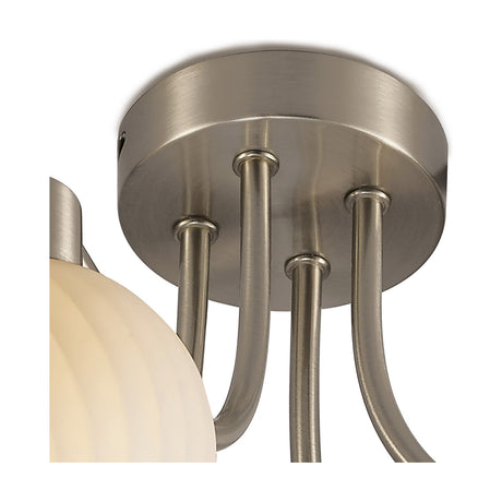 Close-up of the Carmen 4 Light E14 Ceiling Light in satin nickel, showing the round mounting plate with four curved arms holding a frosted opal glass globe, on a plain white background.