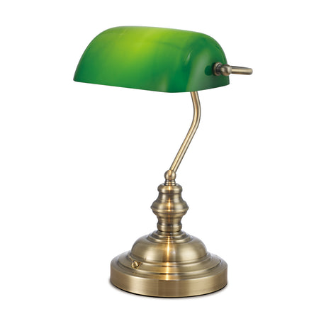 Morgan E27 bankers-style table lamp with curved green glass shade on an antique brass upright and round base, shown on a plain white background.