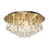 Acton 5 Light E14 Round Flush Ceiling Light, 46cm antique brass disc with cascading clear crystal spheres, shown lit against a plain white background.