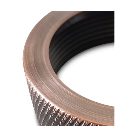 Dreifa 50mm lampholder ring in antique copper, close-up of the deep aluminium collar with knurled edge, on a plain white background.