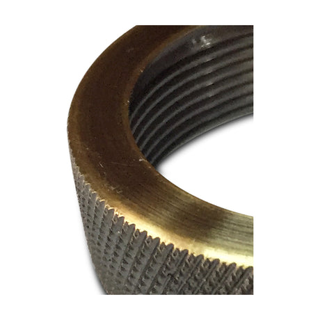 Close-up of the Dreifa Lampholder 50mm shade ring in antique brass, showing its threaded interior and knurled edge on a plain white background.