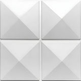 White PVC 3D wall panel, 50 x 50cm, with four square pyramids arranged two by two, raised relief with sharp edges and flat dividing strips, on a plain background.