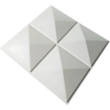 White PVC 3D wall panel, 50 x 50cm, with four square pyramids in a two-by-two layout, raised geometric relief and sharp edges, shown on a plain white background.