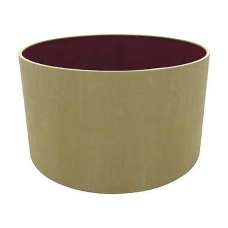 Sigma Lamp Shade 30cm, a wide cylindrical drum shade in antique gold faux silk with a ruby red interior lining, shown on a plain white background.