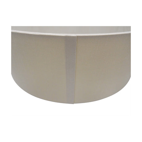 Close-up of the Serena Lamp Shade in nude beige faux silk, showing the fabric texture and vertical seam join on a plain white background.