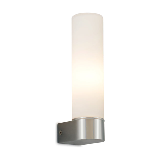 Tasso E14 IP44 wall light with a slim tubular opal white glass diffuser on a polished chrome backplate, shown lit against a plain white background.