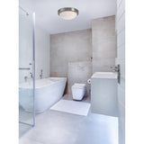 Porter 2 Light E27 Flush Ceiling Light 32cm in satin nickel with opal white glass dome, fitted to the ceiling of a modern bathroom with freestanding tub and vanity.