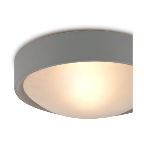 Close-up of the Rondo E27 Flush Ceiling Light in silver, 24cm diameter, showing its round frosted glass diffuser glowing from an inner bulb, on a plain white background.
