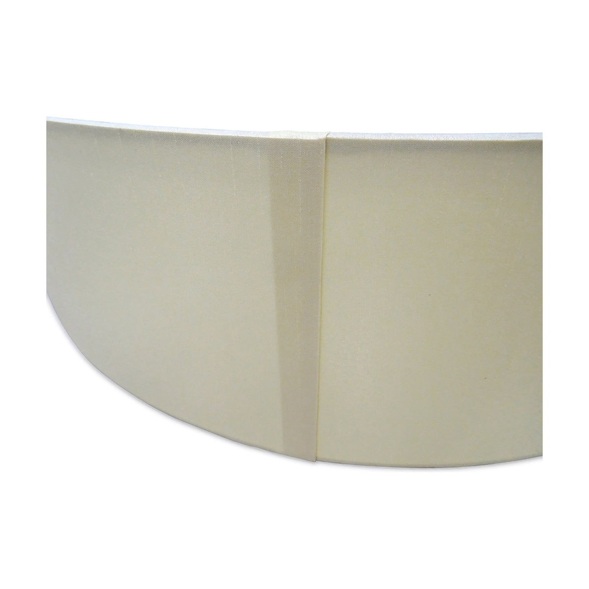 Close-up of the Sigma Cylinder Lamp Shade in ivory pearl faux silk, showing the fabric seam and white laminate lining on a plain background.