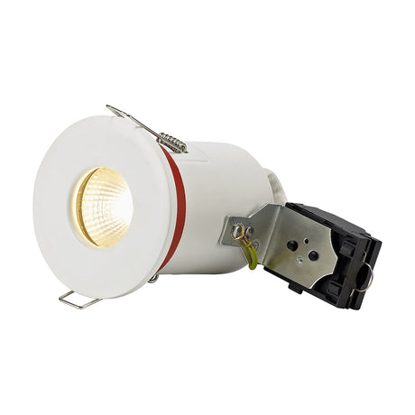 Agni IP65 downlight in white with round fixed bezel, spring clips, GU10 lamp lit warm white, and attached junction box, shown on a plain background.