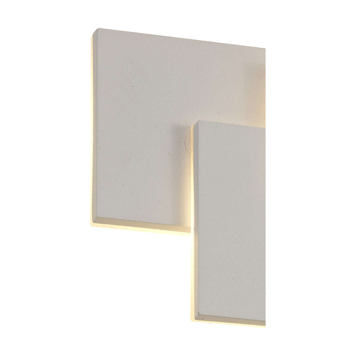 Kiania Rectangular Wall Light 26cm in sand white, close-up view of overlapping square and rectangular panels with warm LED glow along the edges, plain white background.