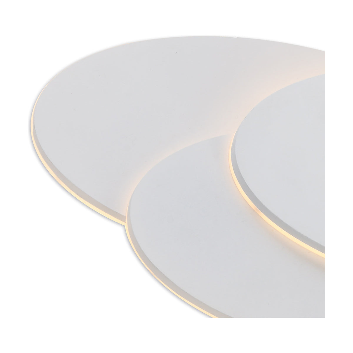 Kiania Oval Wall Light in sand white, close-up of overlapping oval acrylic panels with a warm white LED edge glow, shown against a plain white background.