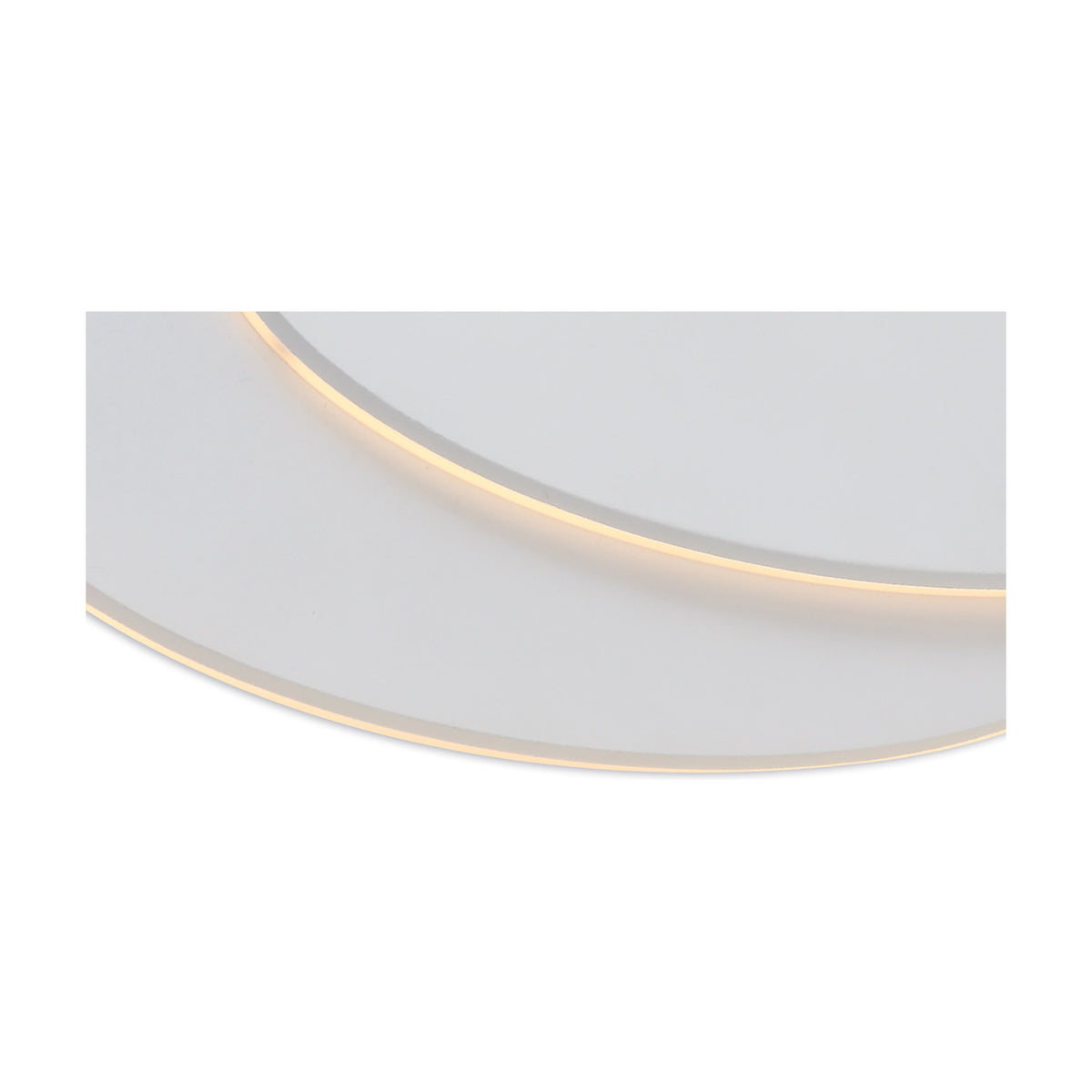 Close-up of the Kiania Oval Wall Light in sand white, showing its curved edge with a warm LED glow along the rim against the white body.