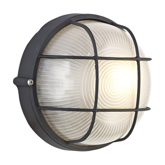 Avon IP44 round outdoor wall light, 19cm, with frosted glass diffuser in a black aluminium surround and cross-bar grille, shown lit on a white background.